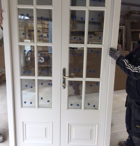 A Joiner Working on a new door