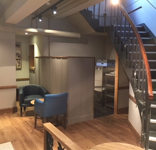 Wooden Stairs and Screens in an Office